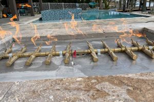custom-stone-gas-firepit-burners-lit-daltons-sprinklers-drainage-and-lighting-foley-alabama